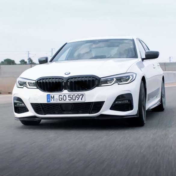 BMW 3 Series Sedan, M Performance parts. Quarter front view of the BMW 3 Series Sedan with M Performance parts.