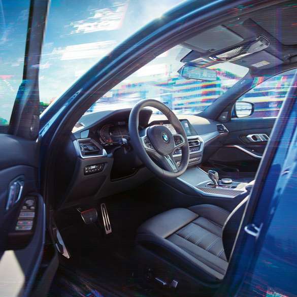 BMW 3 Series Sedan, interior. Close-up of the driver's compartment in the interior of the BMW 3 Series Sedan.