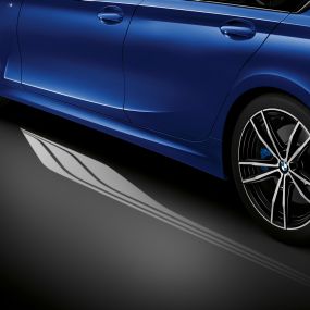 BMW 3 Series Sedan, Welcome Light Carpet. Detailed side view of the open driver's door with Welcome Light Carpet.