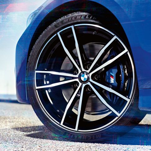 BMW 3 Series Sedan, light alloy wheels 791 M. Close-up of 19'' M light alloy wheels 791 M Jet Black of the BMW 3 Series Sedan.