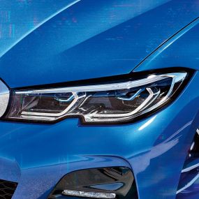 BMW 3 Series Sedan, BMW Laserlight. Lateral close-up of the right front headlights with BMW laserlight.