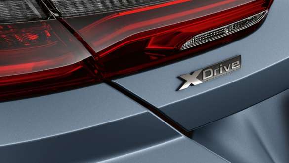 Designation BMW xDrive. BMW 8 Series Coupé, rear view, designation BMW xDrive.