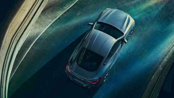 Integral Active Steering. BMW 8 Series Coupé, driving shot bird's eyes view, Integral Active Steering.