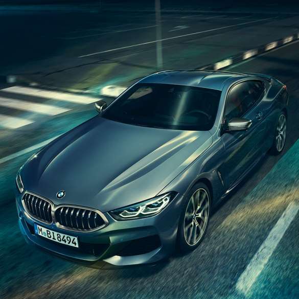 BMW 8 Series Coupé, three-quarter front view. BMW 8 Series Coupé, three-quarter front view, standing with view on engine bonnet.