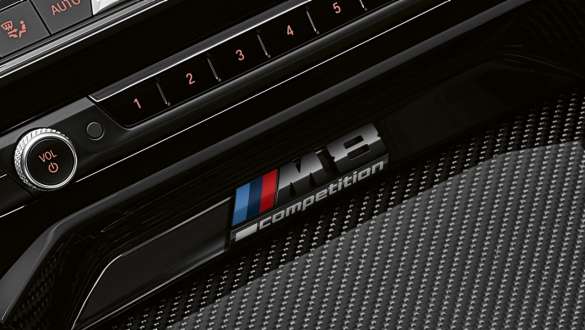 M8 Competition Badge. BMW M8 Competition Convertible, centre console with M8 Competition Badge.
