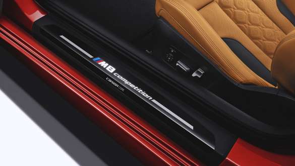 Entry sill with M8 Competition badge. Entry sill of the BMW M8 Competition Convertible with M8 Competition badge.