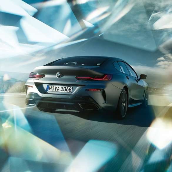 BMW M850i xDrive Gran Coupé three-quarter rear view BMW M850i xDrive Gran Coupé G16 2019 BMW Individual Frozen Bluestone metallic three-quarter rear view