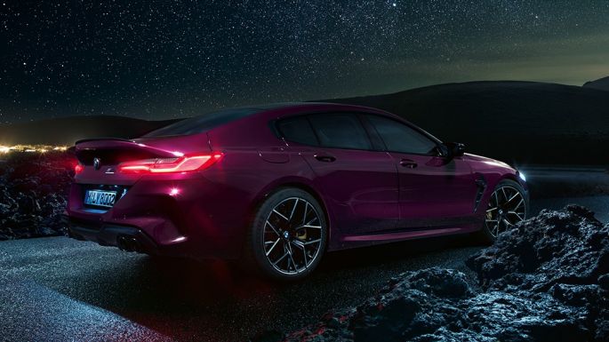 BMW M8 Competition Gran Coupé three-quarter side view from rear BMW M8 Competition Gran Coupé F93 2020 BMW Individual Ametrine metallic three-quarter side view from rear