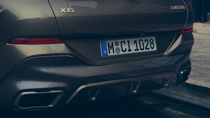 BMW X6 M50i rear view Close-up of the BMW X6 M50i rear