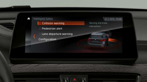 BMW X1, Driving Assistant Plus in the displays and controls. BMW X1, interior with focus on the Driving Assistant Plus in the displays and controls.