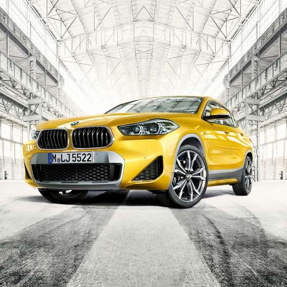 Three quarter front view BMW X2 F39 Three quarter front view BMW X2 2018 F39 Galvanic Gold metallic