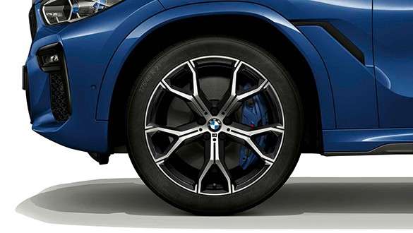 BMW X6 with focus on light alloy wheel. BMW X6 exterior with focus on light alloy wheel.