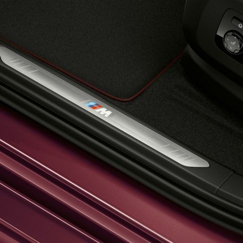 BMW X6 Individual door sill. BMW X6 Individual interior with close-up of door sill.
