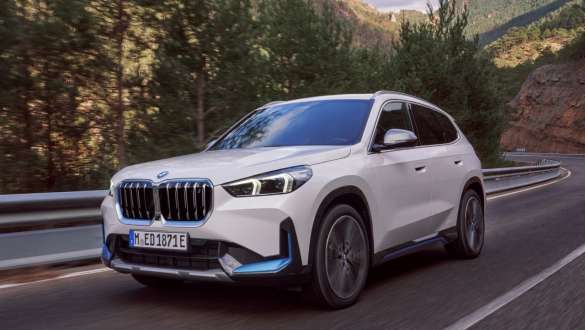 BMW X1 U11 BEV 3/4 front view driving