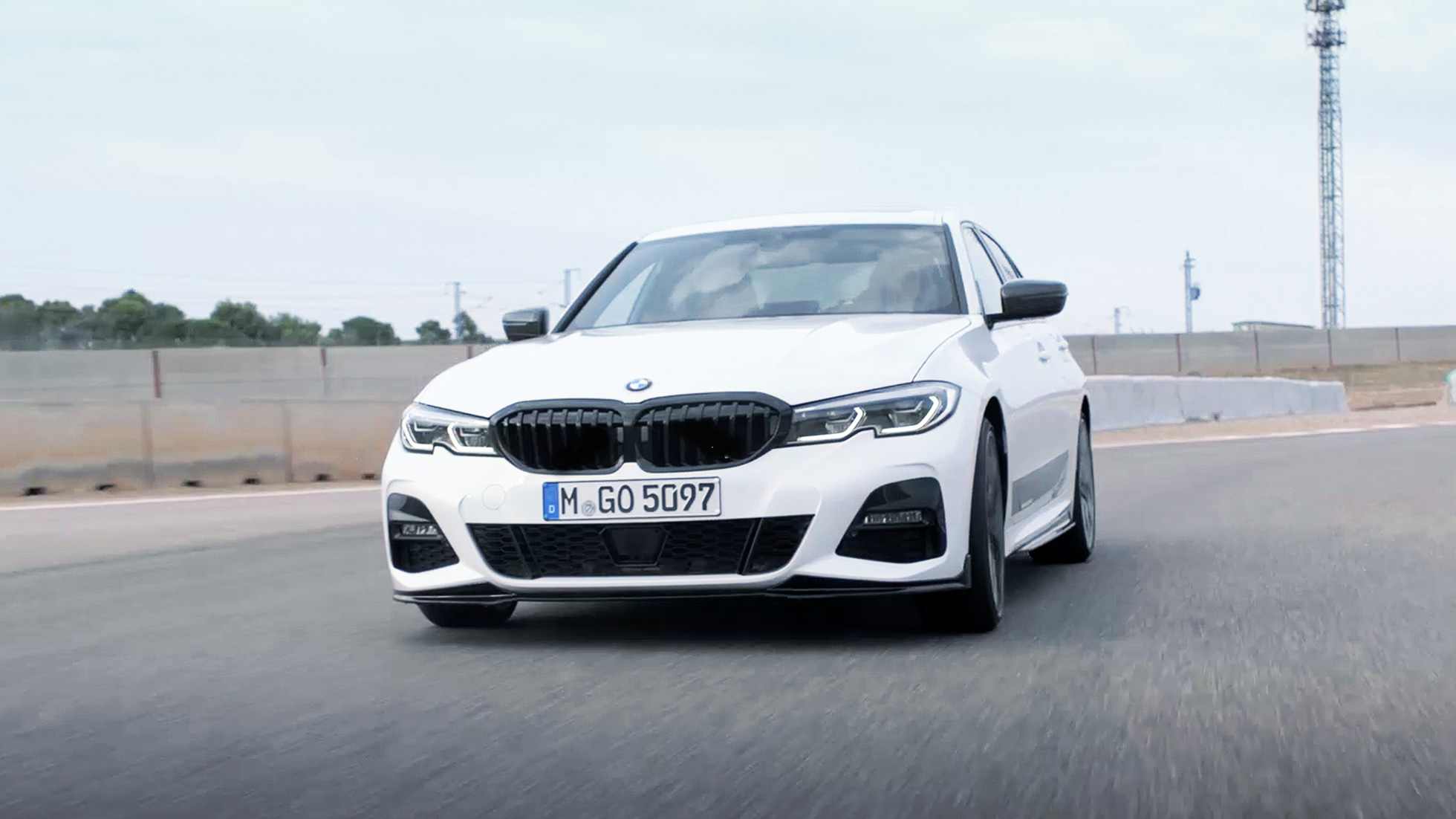 BMW 3 Series Sedan, M Performance parts. Quarter front view of the BMW 3 Series Sedan with M Performance parts.