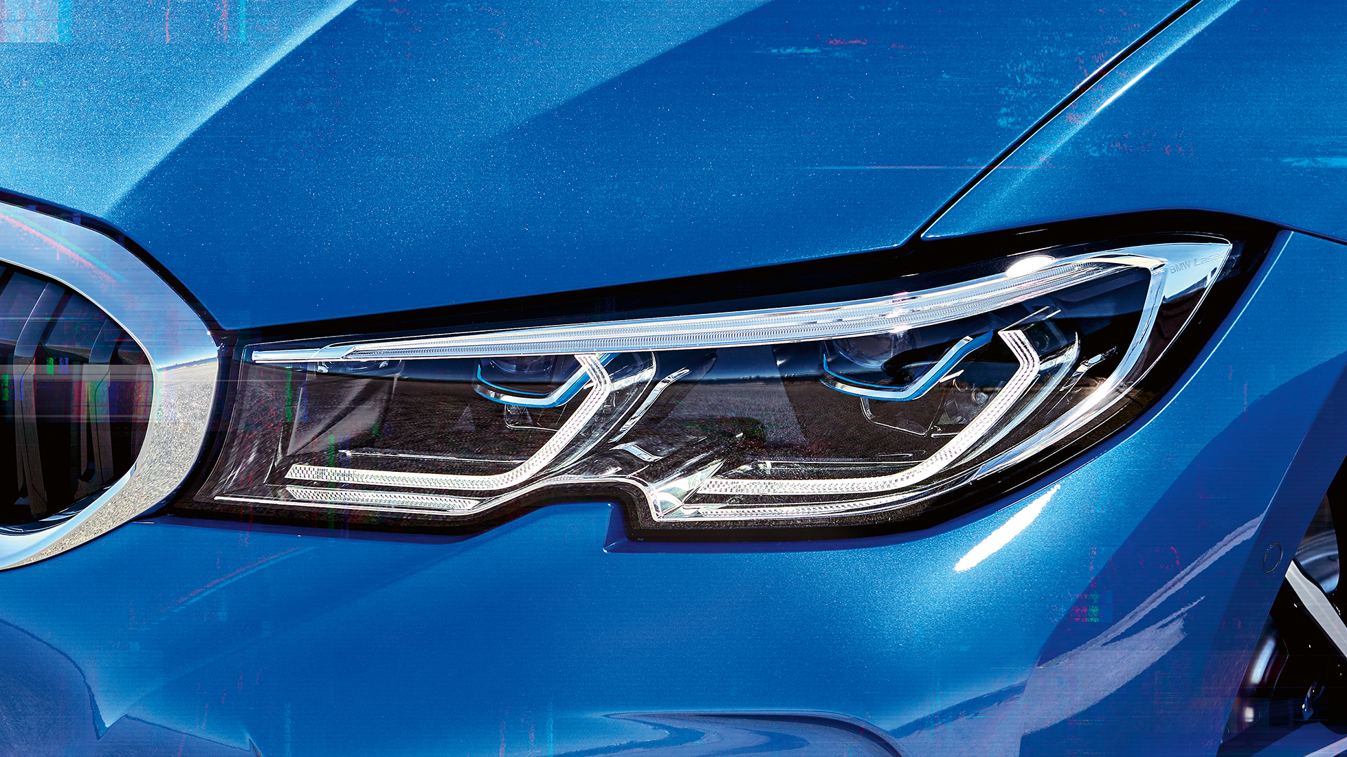 BMW 3 Series Sedan, BMW Laserlight. Lateral close-up of the right front headlights with BMW laserlight.