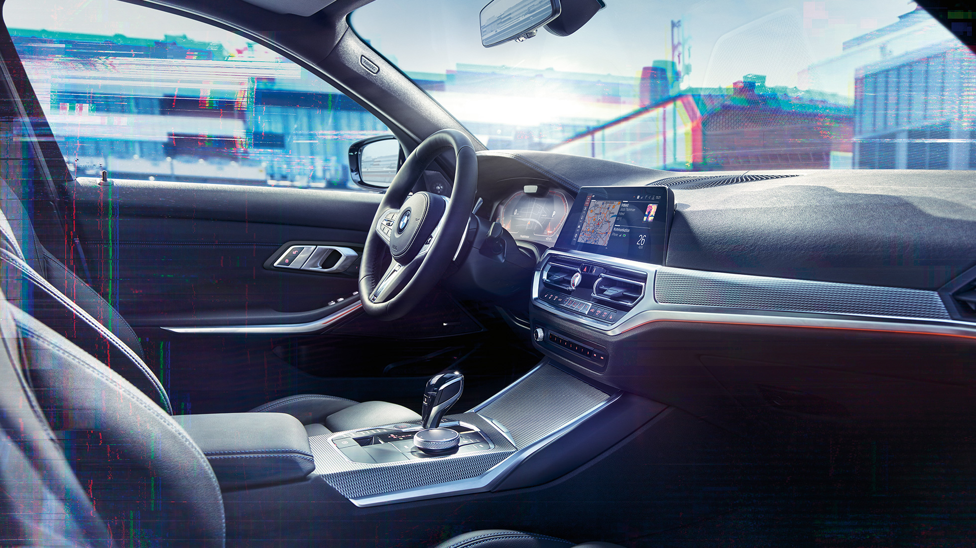 BMW 3 Series Sedan, M instrument cluster. Close-up of the interior of the BMW 3 Series Sedan with a lateral view of the cockpit and an instrument panel combination with M-specific display.