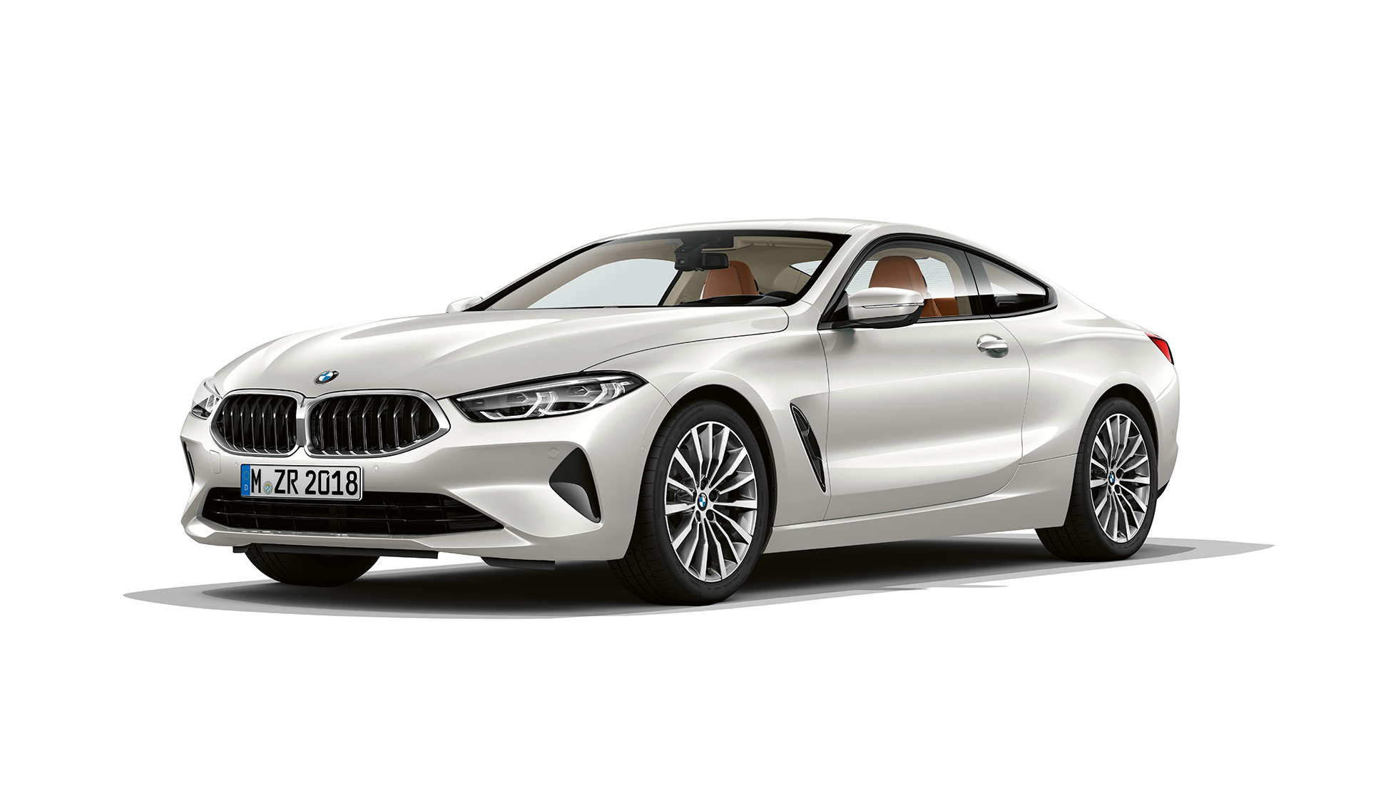BMW 8 Series Coupé, three-quarter front view. BMW 8 Series Coupé, Mineral White metallic, three-quarter front view.