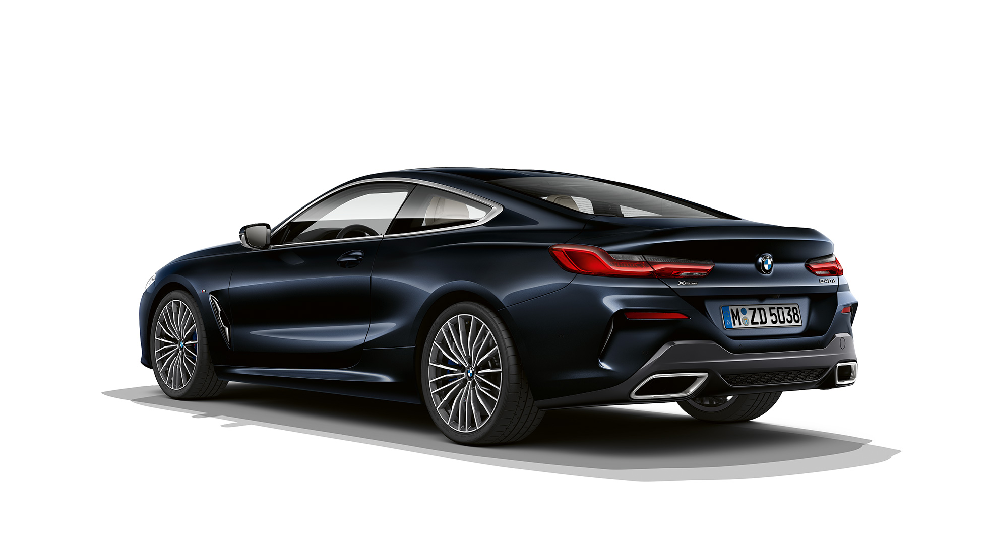 BMW 8 Series Coupé, three-quarter back view. BMW 8 Series Coupé, Carbon Black metallic, three-quarter back view.