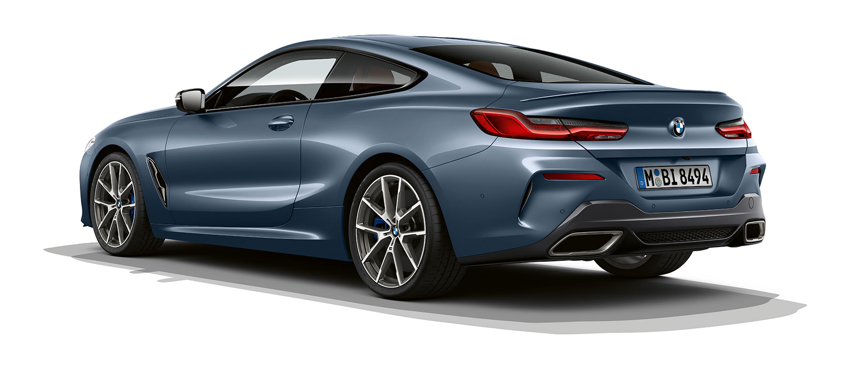 BMW 8er Coupé, Barcelona Blue metallic. BMW 8er Coupé, Barcelona Blue metallic, three-quarter rear view.