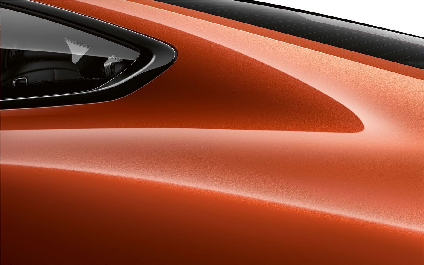 BMW 8 Series Coupé, close-up of C pillar. Close-up of the C pillar of the BMW 8 Series Coupé in Sunset Orange metallic.