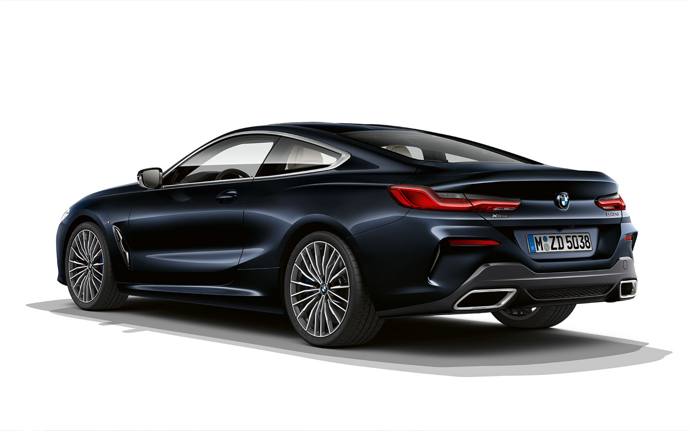 BMW 8 Series Coupé, Carbon Black metallic. Still shot of the BMW 8 Series Coupé in Carbon Black metallic against a white background.