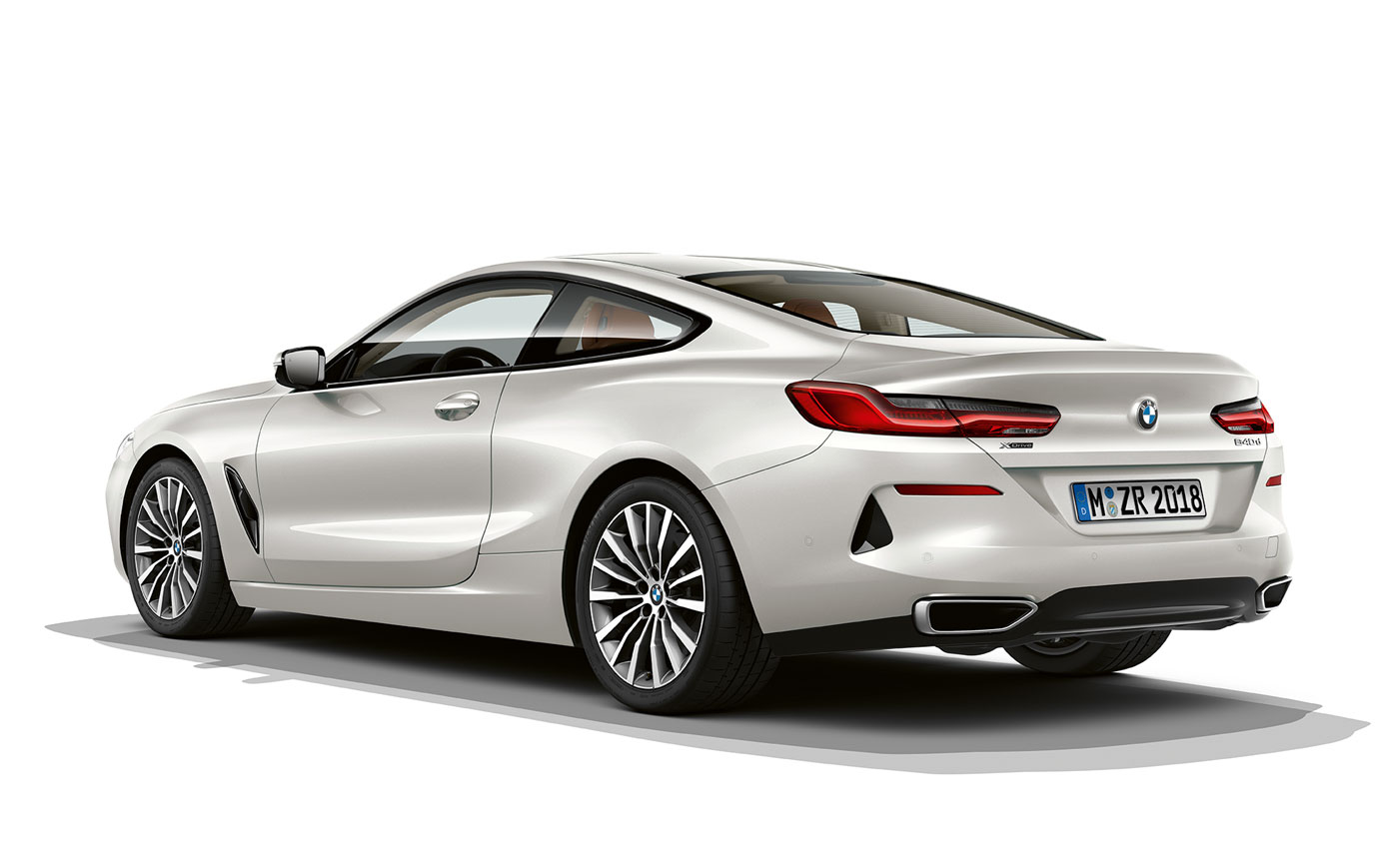 BMW 8 Series Coupé, Mineral White metallic. Still shot of the BMW 8 Series Coupé in Mineral White metallic against a white background.