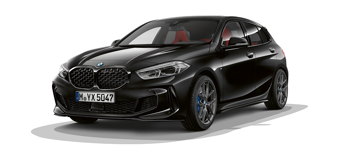 M Performance package. BMW M135i xDrive in Black Sapphire metallic with M Performance package three-quarter front view.