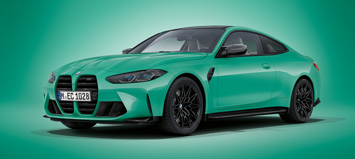 BMW M4 Coupé BMW Individual Mint metallic G82 2021 three-quarter front view standing BMW M4 Coupé BMW Individual Mint metallic G82 2021 three-quarter front view standing