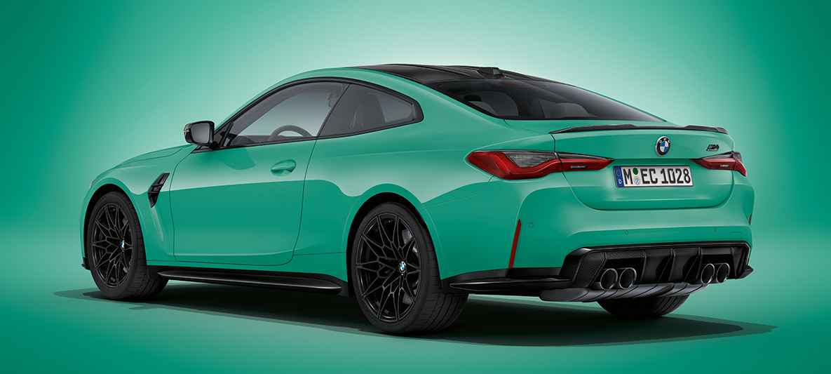 BMW M4 Coupé BMW Individual Mint metallic G82 2021 three-quarter rear view standing BMW M4 Coupé BMW Individual Mint metallic G82 2021 three-quarter rear view standing