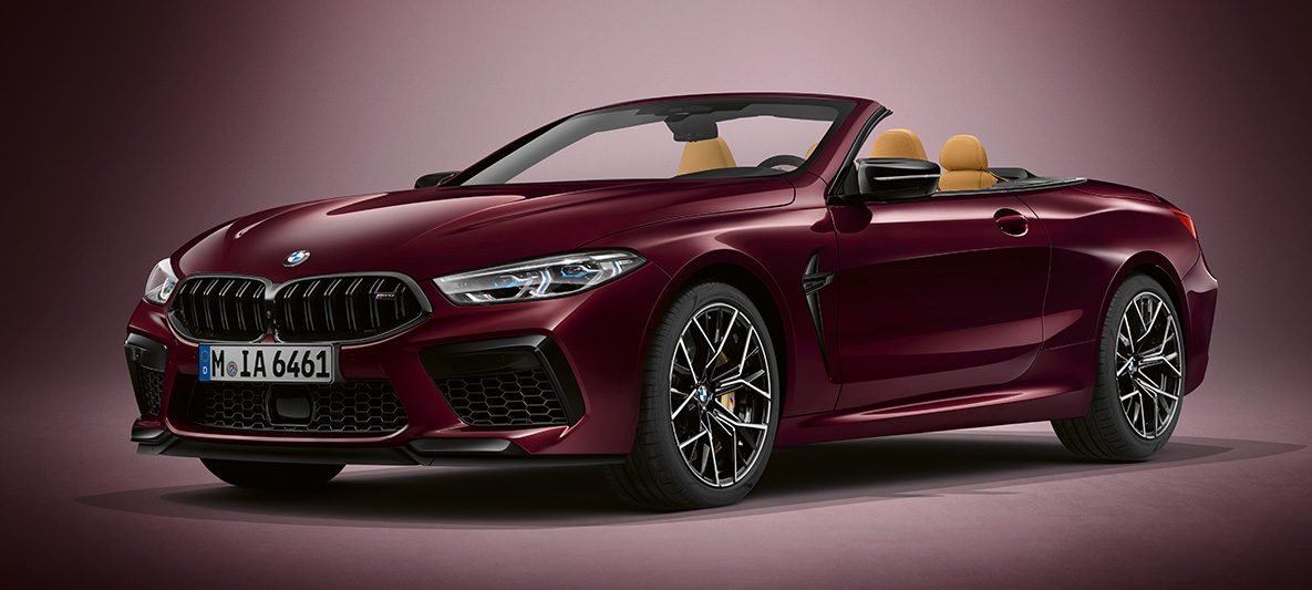 BMW Individual M8 Convertible in BMW Individual Ametrine metallic. BMW Individual M8 Convertible in BMW Individual Ametrine metallic, three-quarter front view.