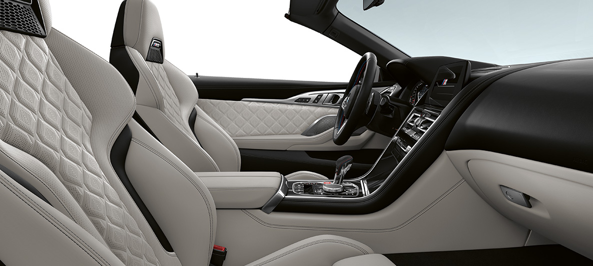 Full fine-grain leather 'Merino' | Silverstone and BMW Individual interior trim Piano Finish Black. BMW M8 Competition Convertible, interior in full fine-grain leather 'Merino' | Silverstone and BMW Individual interior trim Piano Finish Black.