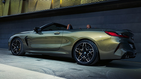 BMW M8 Cabriolet (F91) three-quarter side view standing BMW M8 Cabriolet (F91) three-quarter side view standing