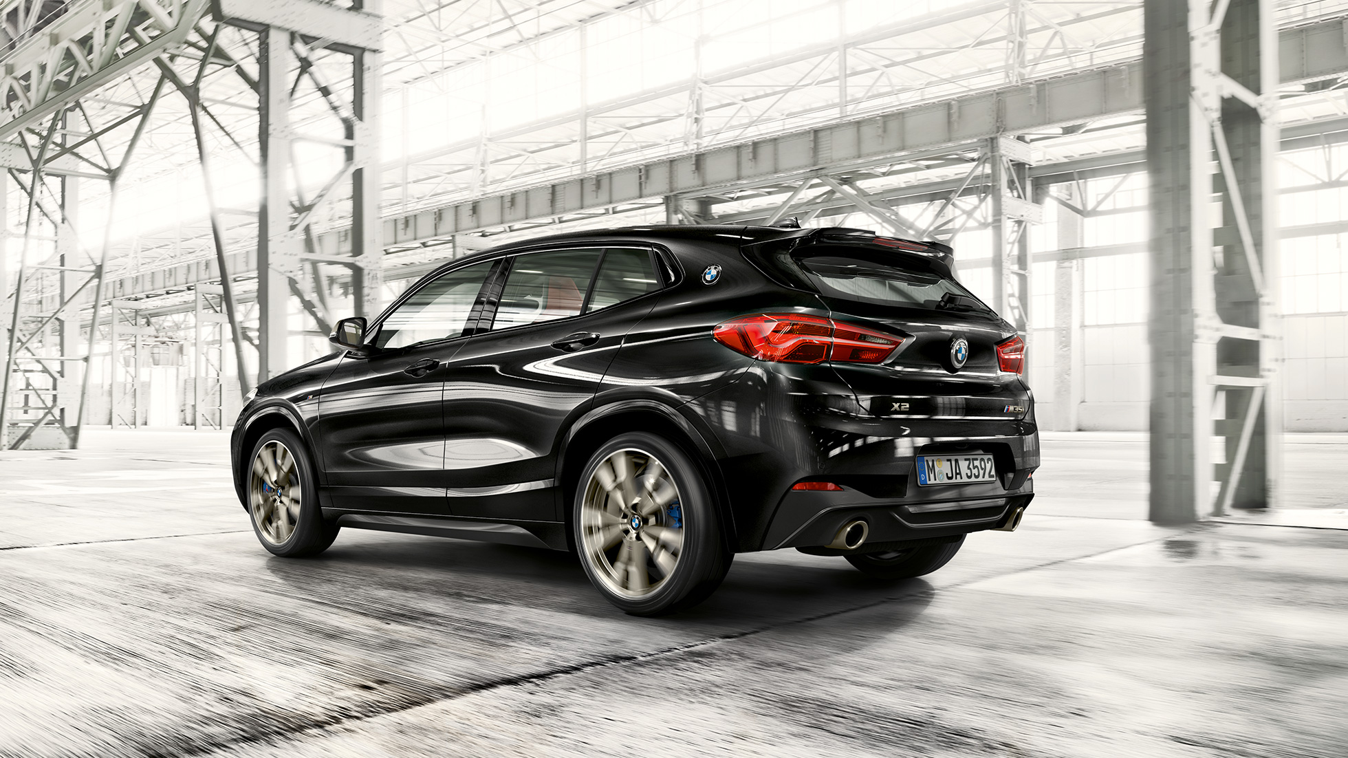 Driving Dynamics BMW X2 M35i Driving Dynamics BMW X2 M35i Sapphire Black metallic F39 2018 three-quarter rear view