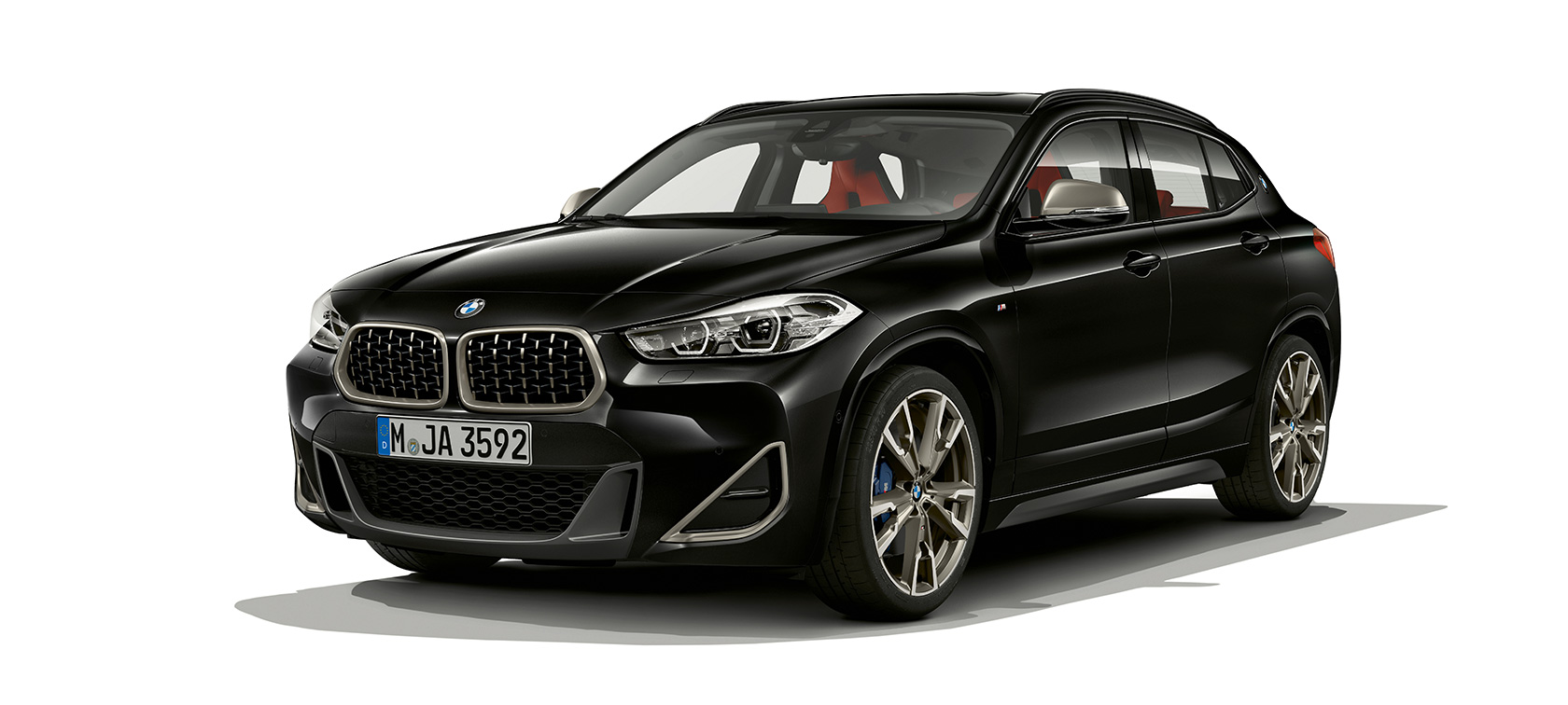 Three-quarter front view BMW X2 M35i F39 Three-quarter front view BMW X2 M35i 2018 F39 Sapphire Black metallic