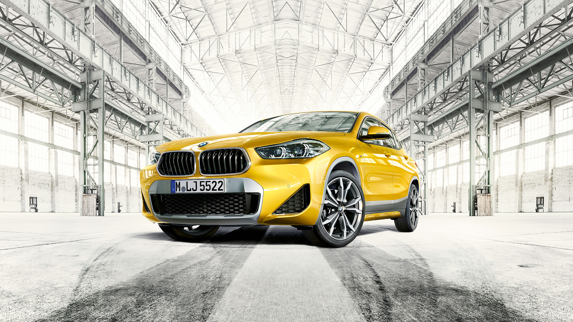 Three quarter front view BMW X2 F39 Three quarter front view BMW X2 2018 F39 Galvanic Gold metallic
