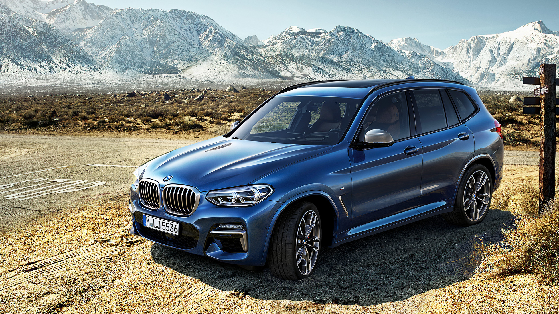 BMW X3 M40i, three quarter front shot in the mountains BMW X3 M40i, three quarter front shot in the mountains