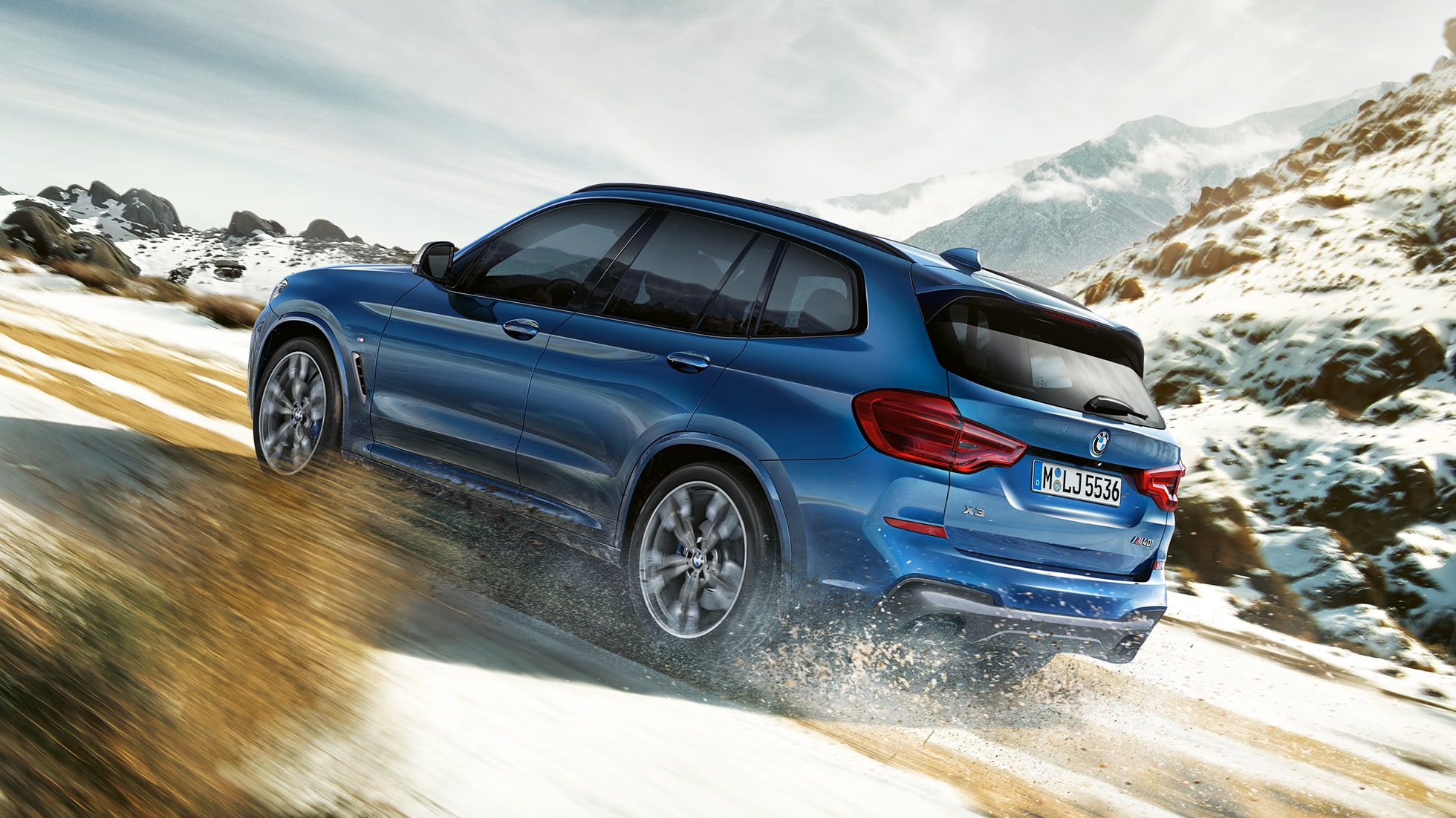 BMW X3 M40i at uphill drive BMW X3 M40i at uphill drive