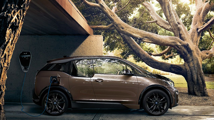 BMW electromobility side view of BMW i3s at charging station