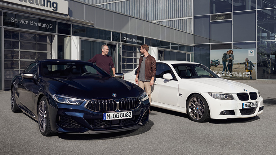 BMW Spring Summer Accessories BMW vehicles in front of building with BMW Service Consulting 