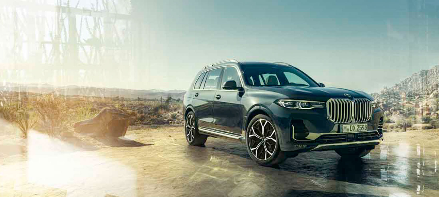 BMW X7 M50i, rear view BMW X7 M50i in Mineral White, driving on an empty highway, rear view, G07, 2019