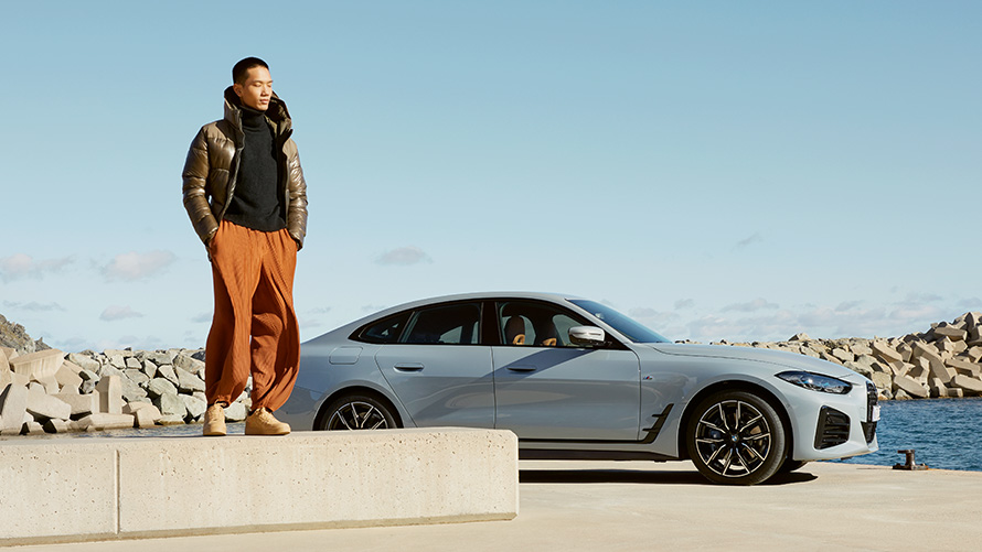 BMW Service Inclusive BMW in front of summer setting with model